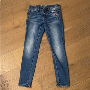 Rose embroidered AE denim skinny jeans